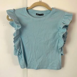 Blue ruffle top